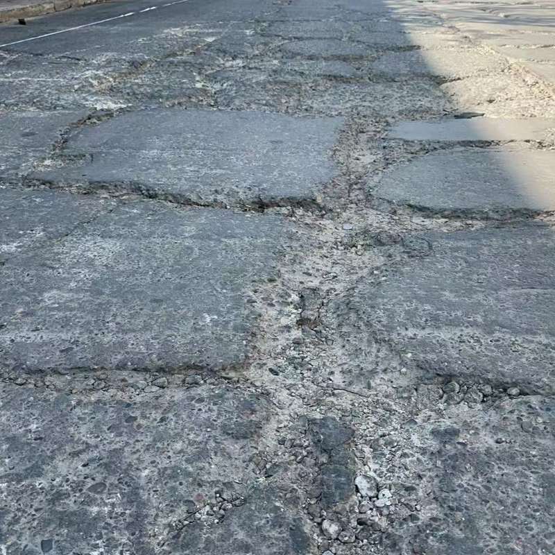 思南路面起砂露石子修补料